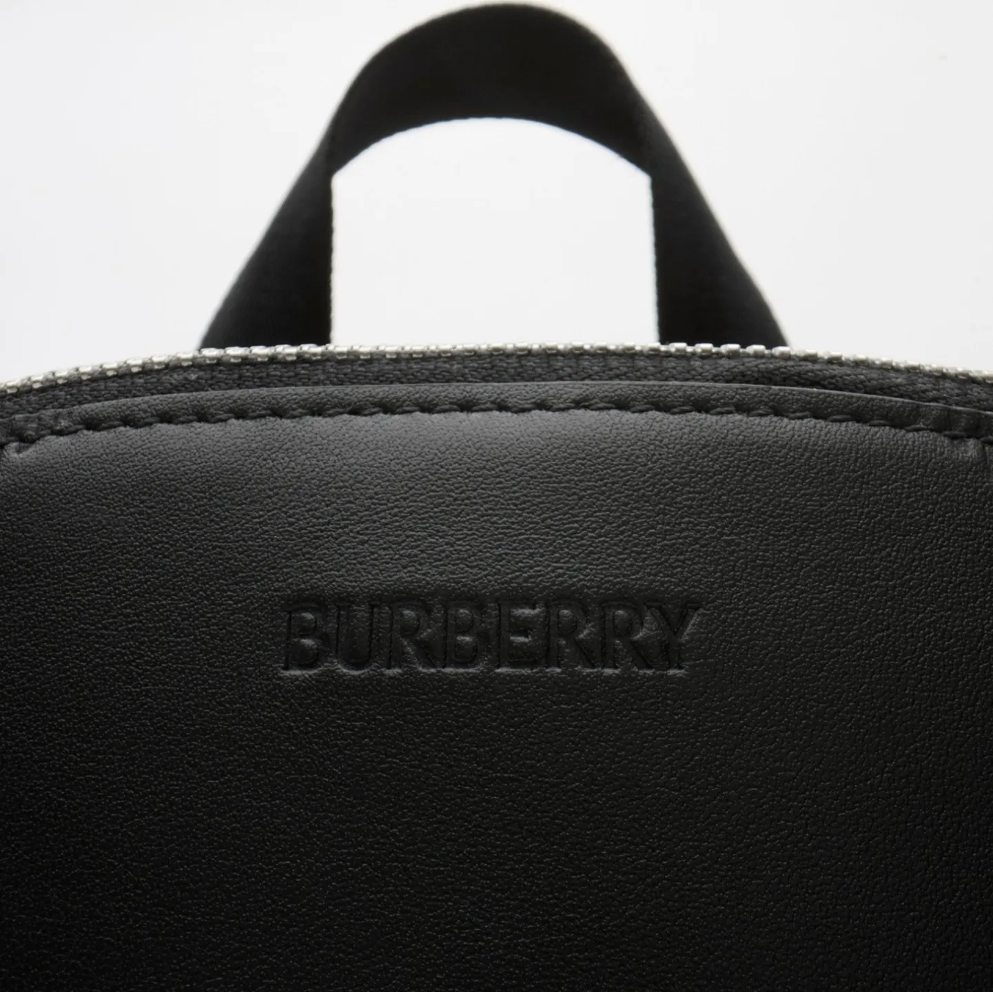 Embossed Check Backpack